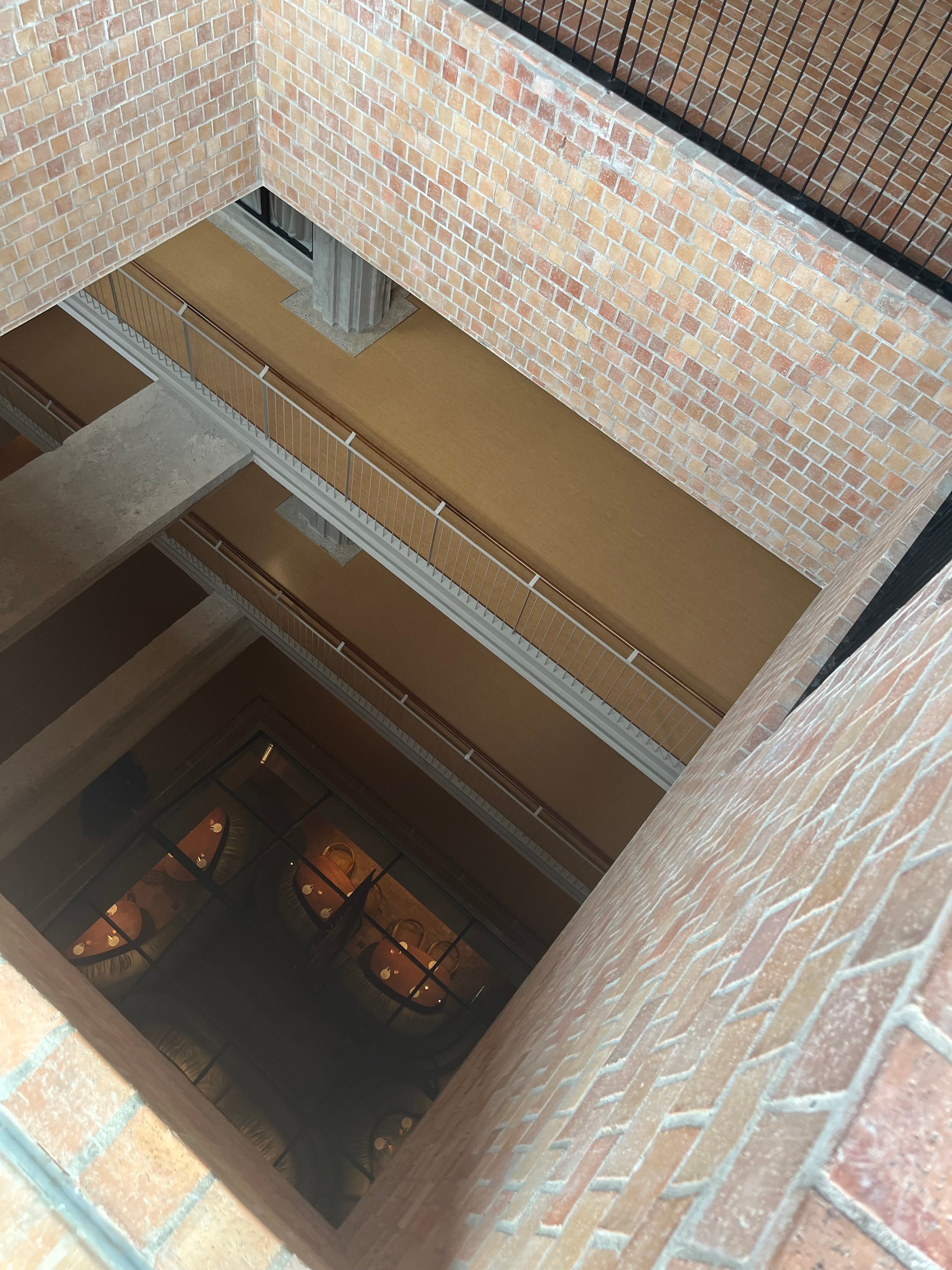 A hospitality experience that bridges generations and has given new life to a historic building. Peering between floors at Else Retreats, Kuala Lumpur. 2023.